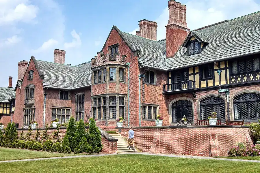 The Tudor Revival Stan Hywet Hall manor house and its lawn in Akron, Ohio