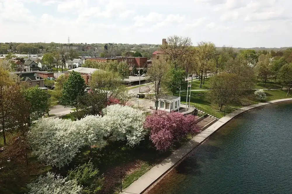 Lake Anna and its park with flowering trees in downtown Barberton, Ohio