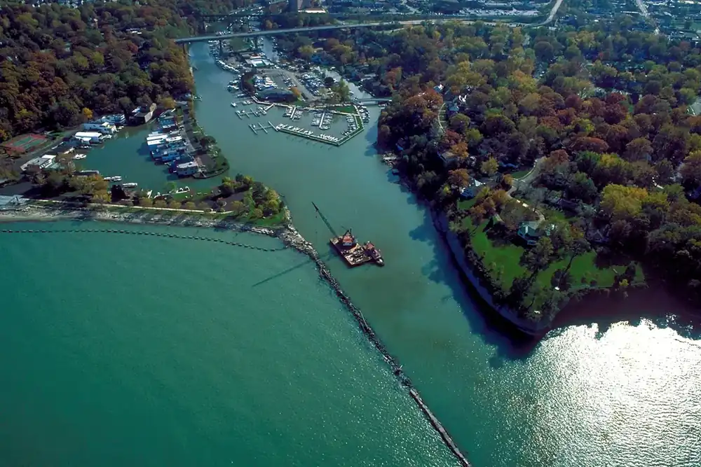 Aerial view of the Rocky River mouth, marinas and wooded neighborhoods in Rocky River, Ohio